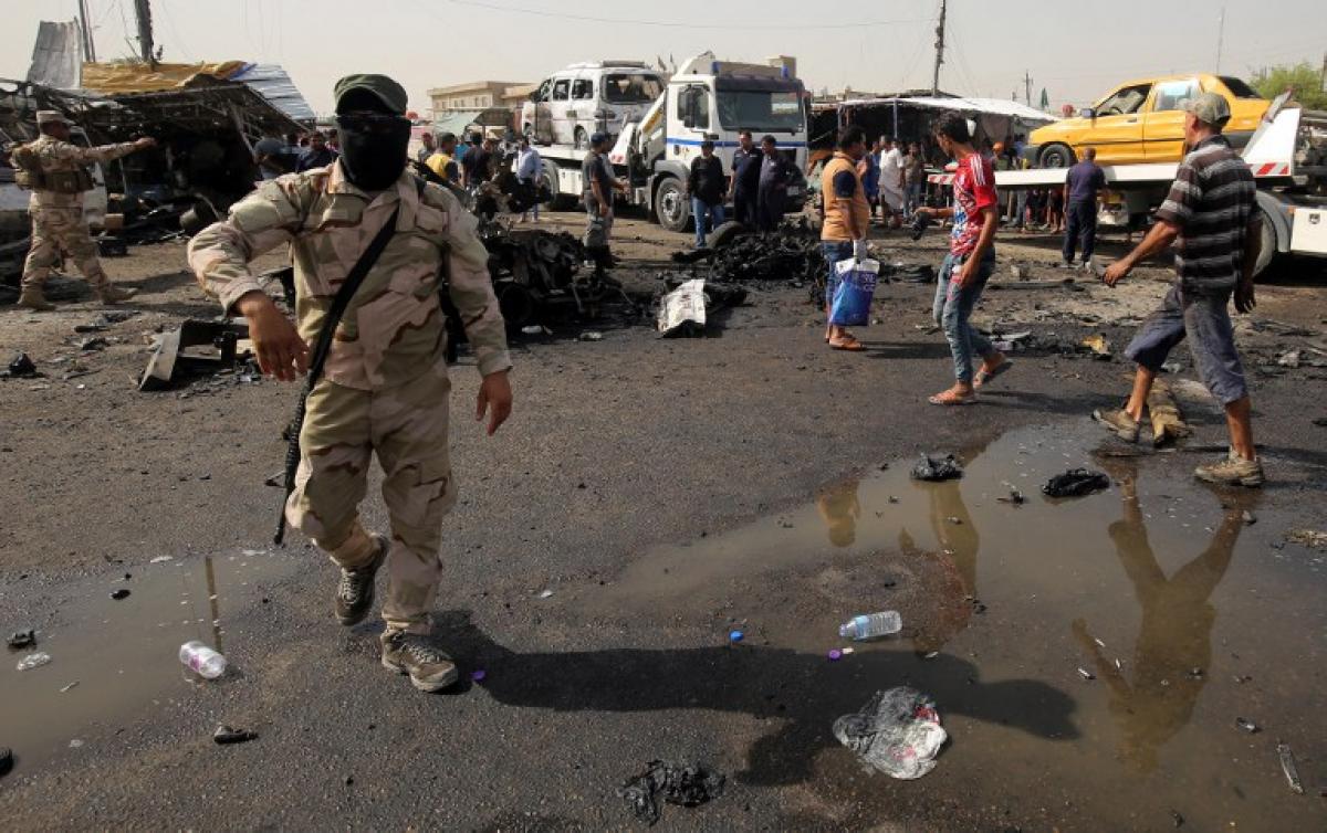 Suicide bombing at funeral gathering kills 31 in northern Baghdad